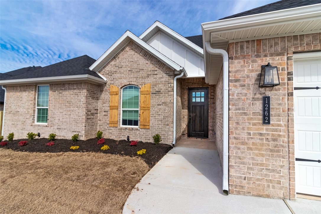 Built in 2024, one level home with open floor plan! Some features include a gas fireplace, granite counters throughout, low e windows, cellulose insulation, solid surface flooring in living areas, ceramic tile in wet areas, carpet in bedrooms, stainless appliance package, 2" faux blinds, gas water heater, and insulated garage doors! Exterior includes full gutters, privacy fenced back yard, and a covered back porch with wiring for cable and plumbing for gas grill.