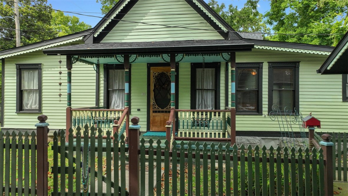 Own a piece of history just steps from downtown. This charming Victorian folk-style home pairs classic character with flexible living thanks to an additional guest house. Inside the main home, youāll find hardwood floors, a bright and airy layout with two bedrooms, two bathrooms, and a bonus room for whatever you need. The screened-in porch overlooks a peaceful backyard, and the oversized garage gives you room for storage or projects. The 312 sq ft guest house makes a great studio, office, or extra space for visitors. A unique setup in a walkable, well-loved location.