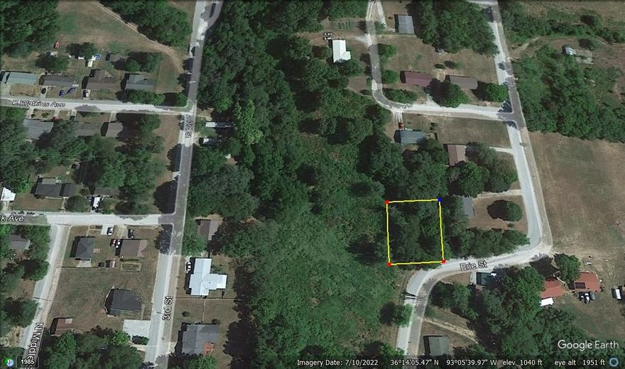 All wooded lot in quiet established neighborhood on the east edge of town, City utilities available, ready to build on.