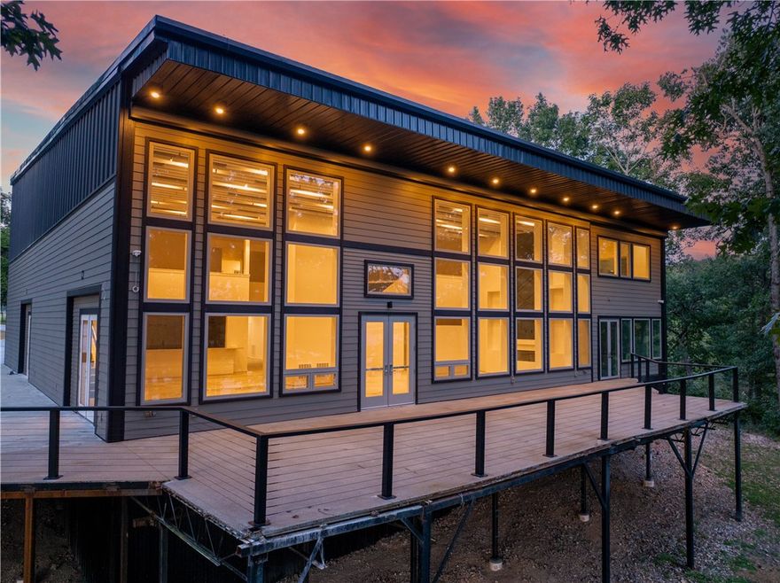 Beaver Lake, one-of-a-kind property that could be an incredible wedding, event space or retreat center.  Nearly eight cleared Park like acres with stable and flexible bonus house. 9400 square-foot home is completely remodeled. two new kitchens, all granite. new bathrooms, three decks, two laundry rooms. Beautiful great room overlooking the lake. Six bedrooms and seven bathrooms great storage for all your needs and a four car heated air conditioned garage, amazing exterior parking, level 5 paint finish. approved for heliport.