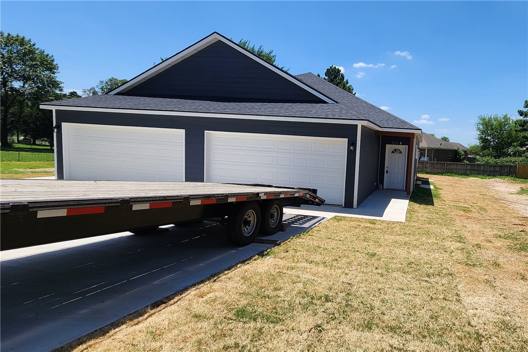 Available July 1st! This clean, move-in-ready home features 3 bedrooms, 2 bathrooms, and a 2-car garage. Built just last year with only one previous tenant, it's ideally located close to downtown Springdale.