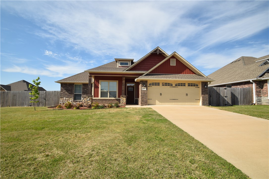 Highly sought after Elkhorn Subdivision! This amazing property sits on .42 acre lot and has open plan with 3 bedrooms and 2 baths. Kitchen has quartz countertops, gas cooktop, farm sink and pantry. Tile wood look floors throughout the home, only one bedroom has carpet. Home comes with refrigerator, washer and dryer. Covered back patio and wood privacy fence. No smoking, no pets. Elkhorn has a community playground and basketball court.