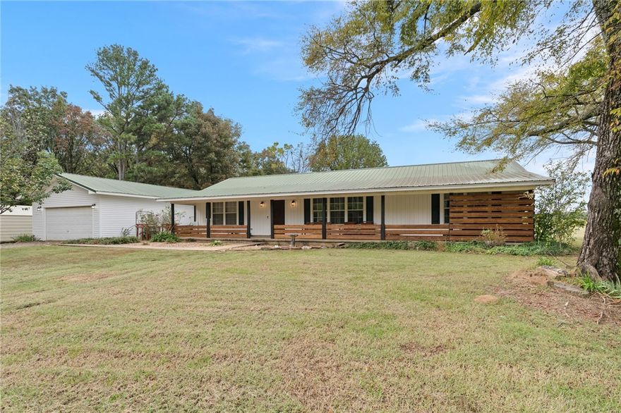 Tucked away in a peaceful, secluded setting, this property offers the best of both worldsāprivacy and convenience. Less than 10 mins. to I-40, shopping, and restaurants. This 3 bdrm, 2 bath home is situated on 2.62 acres, it features beautiful natural surroundings and easy access to nearby amenities. The home is complemented by an oversized garage with a built-in heated and cooled dog kennel with a dog door to an outdoor run, providing plenty of space for vehicles, storage, or hobbies. A 30āx40ā shop with a concrete floor and 2- 10' doors adds even more versatility, perfect for projects, equipment, or a home-based business. Whether youāre looking for a quiet retreat or a property with room to spread out, this one has it all. Enjoy the tranquility of country living without sacrificing accessibilityāthereās space to breathe, create, and truly make it your own. Opportunities like this donāt come along often! Storage building (12'x24'), washer, dryer, 2019 professionally installed hot tub, and refrigerator convey.