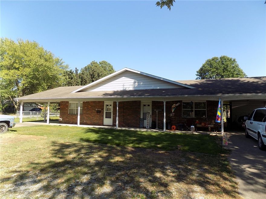 Very nice duplex on a corner lot. Each side has three bedrooms 1 full bath and one half bath. Each unit has its own backyard space and covered porch. Current tenants pay $550. per month, on a month to month agreement. Located in Gentry - a quickly growing small town in NW Arkansas! Great investment property!