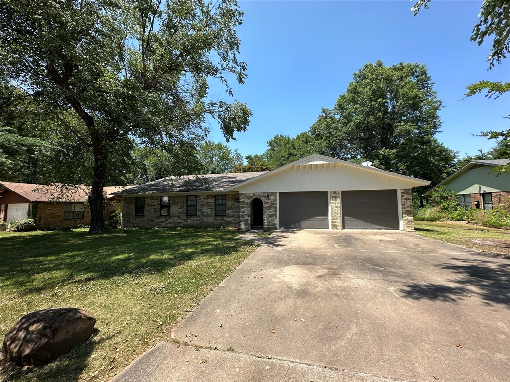 Plenty of room to spread out in this huge 4-bedroom, 2-bath home! Close to the U of A but away from the busy campus scene, with easy access to I-49. Youāll love the big open living areaātons of space for your stuff and for hanging out. Cozy up by the wood-burning fireplace or kick back on the massive deck with built-in seating. Best part? Lawncare is included, so you can just enjoy your home without the hassle.