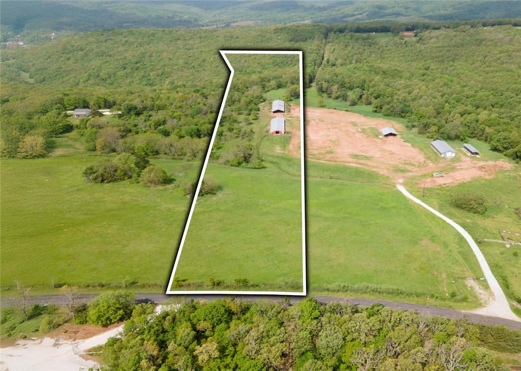 Discover your slice of countryside paradise with this stunning property, perfectly suited for building your dream home or starting a thriving homestead. Adjacent to pristine rural landscapes in West Fork, this land offers a blend of open fields, scattered trees, and breathtaking views, with a wet weather stream, creating an idyllic setting for those craving a peaceful, self-sufficient lifestyle. This property is a rare find with essential utilities already in place, but the well will need some work. Perfect for homesteaders, nature enthusiasts, or anyone seeking a quieter way of life. Donāt miss the chance to create your legacy on this beautiful land!