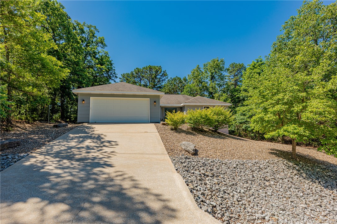 Enjoy the serenity that this private property has to offer. This home is convenient to shopping and the highway while still offering peace and quiet. It is the last house on this street with empty lots on either side. The low maintenance rock yard has been professionally landscaped. One owner. This home has been meticulously maintained. Home is being sold as is. No repairs will be made.