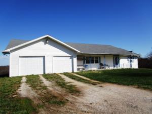 Come see this large country home completely furnished; including: 50'' flat screen TV; appliances; almost new zero turn lawnmower; tool boxes; table saw; fully stocked kitchen; utility trailer; new H/A and much much more; a few miles from town; with beautiful acreage and a view; it features an ex-large kitchen with custom cabinets; ex-large living room; master with newly updated walk-in
