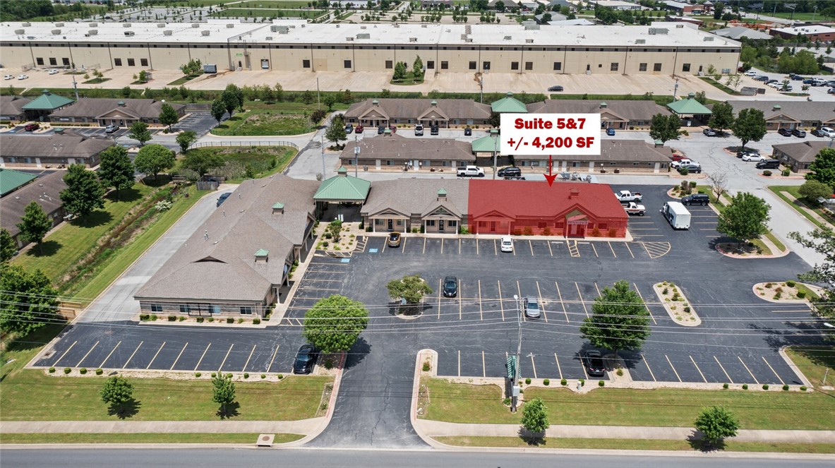 +/- 4,200 SF of space with a vent hood, perfect for a restaurant, cafe, or coffee shop. Space features an outdoor patio, a bar, and two open areas with booth seating and enough room for additional table seating, and two private restrooms. End cap space located within Oak Trace, an office park that is in very nice condition and well-kept. Ample parking on-site and ample opportunity for tenants to have signage both on marquees and on the buildings and doors into suites. This office park is in the heart of Bentonville just 5 minutes from Downtown Bentonville or the new Walmart Home Office and 15 minutes to the XNA airport. Tenants are responsible their own utilities.