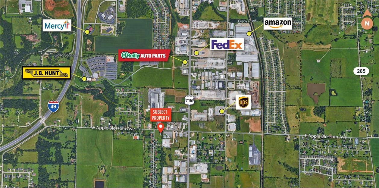 Prime development opportunity with 2.16+/- acres along high-traffic artery just south of Lowell, the geographic center of Northwest Arkansas and a major transportation and freight services hub. Property will benefit from future Apple Blossom Road improvement project and from robust growth in the submarket fueled by recent corporate investments in the area and planned multi-million dollar expansion projects by major companies, JP Hunt and Key Tronic. High visibility frontage along Apple Blossom and Walden Street with quick access to I-49, Hwy 71B and Hwy 265. Quonset-style building onsite includes shop and heated office area. Level, cleared, corner lot is ideal for development with C-2 zoning offering a broad range of use options.