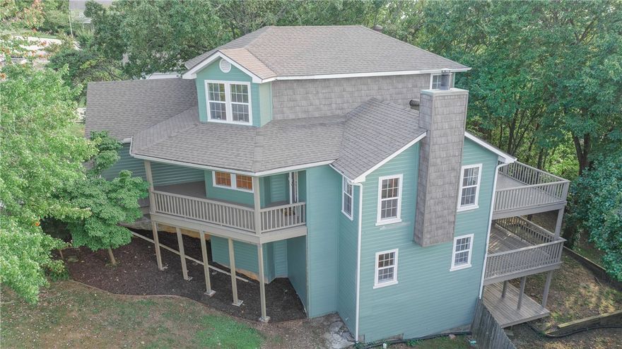 4 Bedroom, 3 Bath Home minutes from the University of Arkansas. This three story home has been completely updated. Enjoy fresh exterior and interior paint, remodeled bathrooms, and refinished hardwood floors that bring charm and modern appeal. The home features multiple living areas, including a second living room that’s perfect for entertaining or a cozy movie night, plus a dedicated office space ideal for remote work or study. With plenty of storage throughout, you’ll have space for everything you need. Step outside to enjoy three private decks upper, middle, and lower. From the primary bedroom or main living room, step out onto the upper deck perfect for morning coffee or evening sunsets. From the second living room or an additional bedroom, access the middle deck, ideal for relaxing or entertaining. On the ground level, enjoy the lower deck, a peaceful retreat all surrounded by nature. Just 5 minutes from the University of Arkansas and close to Fayetteville’s best restaurants, shopping, and entertainment.