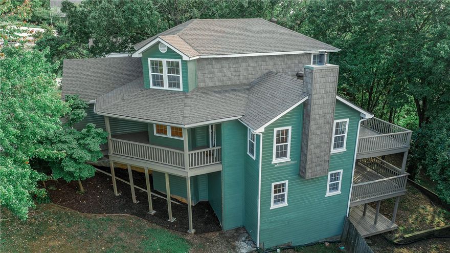 4 Bedroom, 3 Bath Home minutes from the University of Arkansas. This three story home has been completely updated. Enjoy fresh exterior and interior paint, remodeled bathrooms, and refinished hardwood floors that bring charm and modern appeal. The home features multiple living areas, including a second living room that’s perfect for entertaining or a cozy movie night, plus a dedicated office space ideal for remote work or study. With plenty of storage throughout, you’ll have space for everything you need. Step outside to enjoy three private decks upper, middle, and lower. From the primary bedroom or main living room, step out onto the upper deck perfect for morning coffee or evening sunsets. From the second living room or an additional bedroom, access the middle deck, ideal for relaxing or entertaining. On the ground level, enjoy the lower deck, a peaceful retreat all surrounded by nature. Just 5 minutes from the University of Arkansas and close to Fayetteville’s best restaurants, shopping, and entertainment.