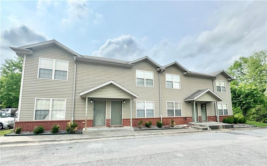 2 Bedroom 1.5 bath townhome close to U of A campus. Spacious living room opens to kitchen. Electric range, refrigerator, washer/dryer included. Immediate Availability! Apply at PrimeNWA.com