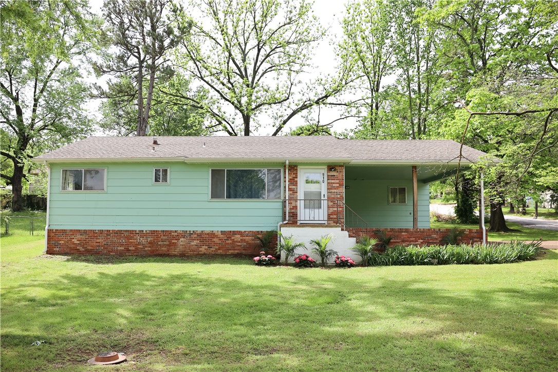 Corner the market on charm! This delightful 3-bedroom, 1.5 bath home with curb appeal in quiet Harrison neighborhood sits on 0.25 acre corner lot with fenced backyard within walking distance of Forest Heights Elementary. Obviously well cared for, it features wood and vinyl flooring throughout, including original hardwood floors refinished in 2021. Kitchen includes eat-in space and stainless range, microwave, and fridge. The primary bedroom is spacious, and the two additional bedrooms connect with a Jack-&-Jill half bath. The owner has performed several updates including new gutters, fascia and soffits in 2021, water lines replaced in 2022, and new hot water heater in 2024. Kitchen appliances as well as washer and dryer all convey. Wonderful starter home or more! Schedule your showing today. Information deemed reliable but not guaranteed; buyer to verify all.