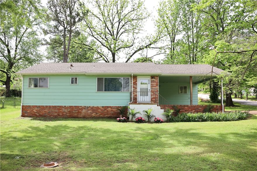 Corner the market on charm! This delightful 3-bedroom, 1.5 bath home with curb appeal in quiet Harrison neighborhood sits on 0.25 acre corner lot with fenced backyard within walking distance of Forest Heights Elementary.  Obviously well cared for, it features wood and vinyl flooring throughout, including original hardwood floors refinished in 2021.  Kitchen includes eat-in space and stainless range, microwave, and fridge. The primary bedroom is spacious, and the two additional bedrooms connect with a Jack-&-Jill half bath. The owner has performed several updates including new gutters, fascia and soffits in 2021, water lines replaced in 2022, and new hot water heater in 2024. Kitchen appliances as well as washer and dryer all convey. Wonderful starter home or more!  Schedule your showing today. Information deemed reliable but not guaranteed; buyer to verify all.