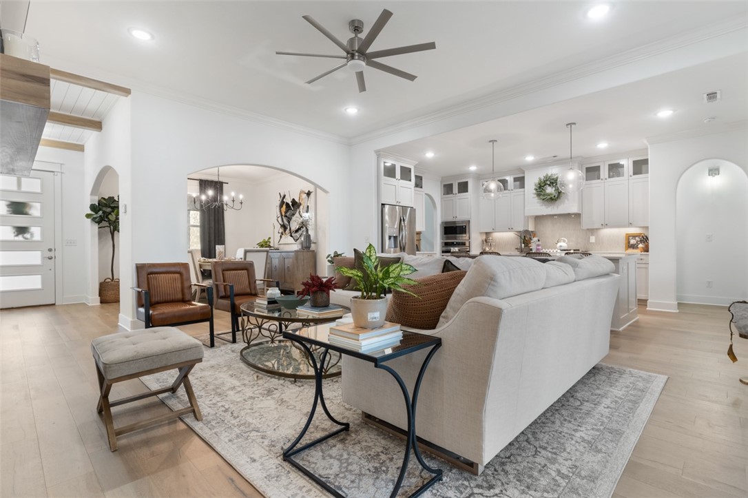This home shows like a true model home! Located in the highly desired Elm Springs area, this home has it all. The main level has 4 bedrooms and 2.5 baths. Gorgeous open split floor plan thoughtfully laid out. The stairwell is at the back of the home and leads up to a 5th bedroom and bathroom with walk in closet. Would also make a great bonus space. Mill Park is a brand new community and is super close to Hwy 112 and 612 for ultra convenience. Custom cabinetry, eye catching flooring, and architectural beams create a dramatic yet sophisticated feel. Homeowner has upgraded some of the lighting and hardware on cabinetry to high end finishes. Back yard backs up to a field for privacy and features a deck and a built in firepit. Open houses both Sat and Sun from 1-3. This one surely won't last long so act fast.