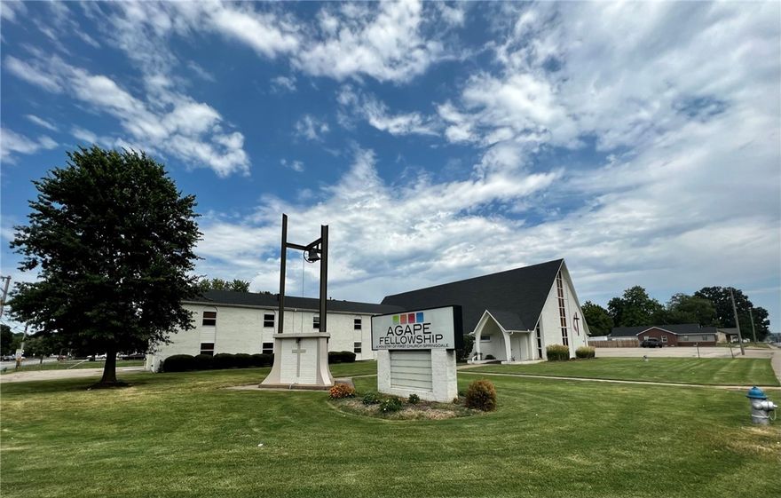 Unique opportunity to purchase a fully functioning church building, community center, or repurpose for your specific need. This property is located on a hard lighted corner in the middle of Springdale, AR and features 2 parcels totaling 5.98 acres and a 15,418sf church. The church east office building is 2 stories with restrooms on each floor and 16+ offices. The west building is two stories with a large fellowship hall, full kitchen, and 2 bathrooms. The second story has a large meeting/rec room and a large office. In between the two buildings is a 320 person(subject to fire code verification) sanctuary. The church is contained on 1.1 acres leaving 4.88 acres for immediate development. 4.88 acres currently zoned single family but the city has shown interest in allowing MF12 zoning.