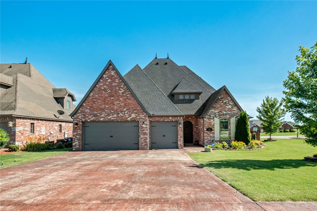 Exquisite, designer details & upgrades throughout highlight the beauty & functionality of this stunning, 4 bedroom + office home. The main level includes the living room, eat-in kitchen, office, powder room, master suite and utility room. Upstairs is a second bed/bath ensuite and 2 other bedrooms that share a
Jack-and-Jill bathroom. The main living area features an office with French doors, stunning brick entry,
exposed wood beams, fireplace, oversized picture windows and elegant light fixtures. The chef’s kitchen is equipped with granite countertops, stainless appliances, pot filler, spacious pantry, butcher block island, custom cabinetry and a gorgeous wood shiplap ceiling. The master suite is a retreat featuring exposed beams, tiled shower, dual vanity and a spacious walk-in closet that leads to the laundry room.No carpet! Abundance of storage with walk-in decked attic. Upgraded roll-out windows & wood-look tile throughout. Conveniently located near schools, bike trails and downtown Bentonville.
