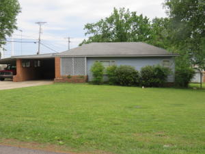 CHERISHED home of yesteryear offers a cute floor plan with loads of personality! Cupboard-clad kitchen has an adorable corner window sink. Built in shelving, storm cellar, covered porches, extra patios, gorgeous lawn! Spacious family room. Some new cedar fencing! Plenty of parking space! Owner will consider leaving TVs and mounts, some furniture. All appliances convey except for the freezer. Rock storm cellar in backyard. Outbuilding conveys. Very convenient location! See Private Remarks for the seller's pets during the showing.