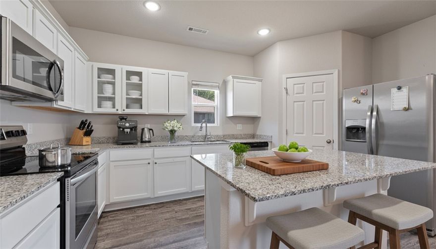 PRICE IMPROVED! Paid-off solar panels, fresh interior updates, and a spacious corner lot—this home is set up for comfort and savings from day one. New paint and carpet throughout give it a clean feel, and the granite kitchen counters add a nice touch. Built by RC, this home comes with appliances that convey and a layout that makes the most of the space. Sitting on a large lot with room to expand or enjoy, it’s move-in ready.