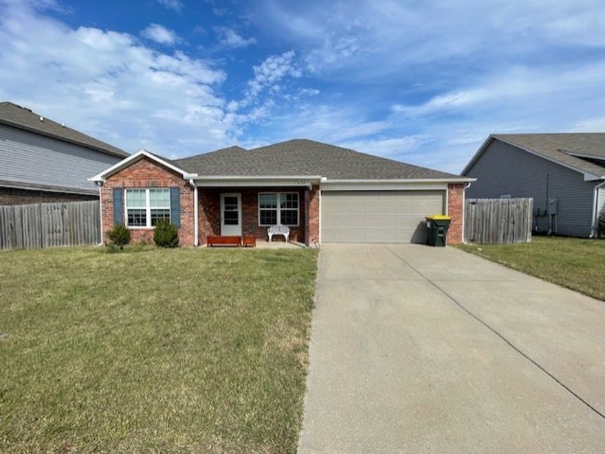 Charming home in Morningside Estates! This adorable 4-bedroom, 2-bathroom property features a functional open floor plan that creates a warm and inviting living space. The lovely eat-in kitchen offers a wraparound bar with seating and a pantry for extra storage. Enjoy a split-bedroom layout providing privacy and comfort. The fully fenced backyard with a patio area is perfect for relaxing or entertaining. Conveniently located with easy access to Hwy 71B and I-49, and less than 15 minutes from XNA, Downtown Bentonville, and the Walmart Home Office. Don’t miss your chance to see this one today!**$250 non-refundable pet deposit **