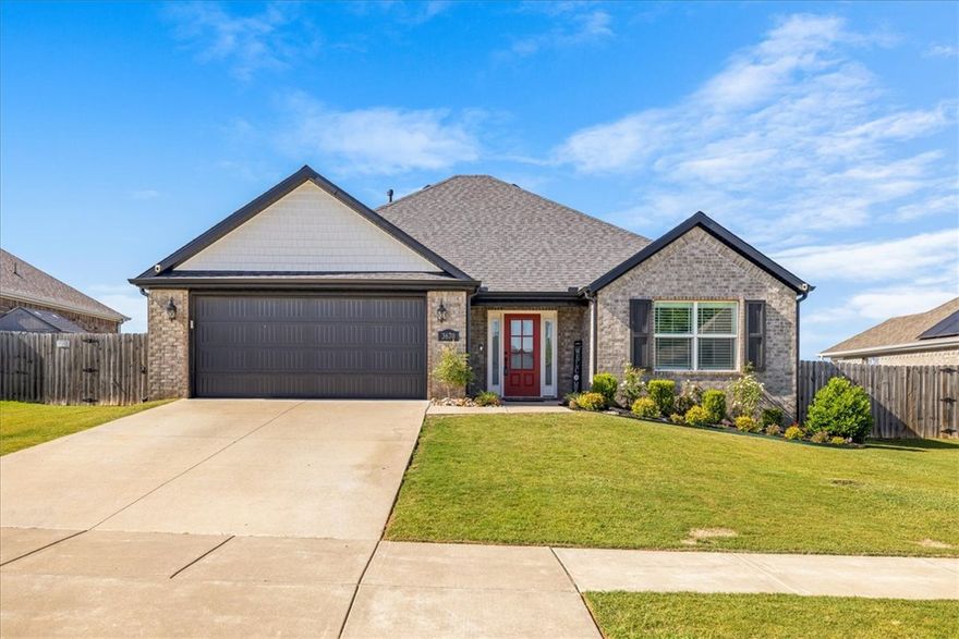 Built by Riggins Construction, this home pairs a true open layout with a long list of upgrades, starting with paid-off solar panels that keep the electric bills low. The kitchen features granite countertops, a gas range, tile backsplash, and a farmhouse sink. LVP flooring runs throughout, so no carpet anywhere. The primary bedroom adds character with wood beams, and the primary bath features a shower with a frameless glass door and a soaking tub. You'll also find crown molding in the main living area and louvered wood shutters carrying a finished look through the home, low flow toilets, smart thermostat, plus electrical outlets built into the soffits. The roof was replaced in December 2025, along with a new garage door motor. Out back features an extended concrete patio with a pergola & wood privacy fence. The backyard backs to a neighborhood retention pond, no neighbors directly behind giving you space and quiet. Located .6 miles to The CL "Charlie and Willie" George Park plus easy access to Don Tyson Pkwy.