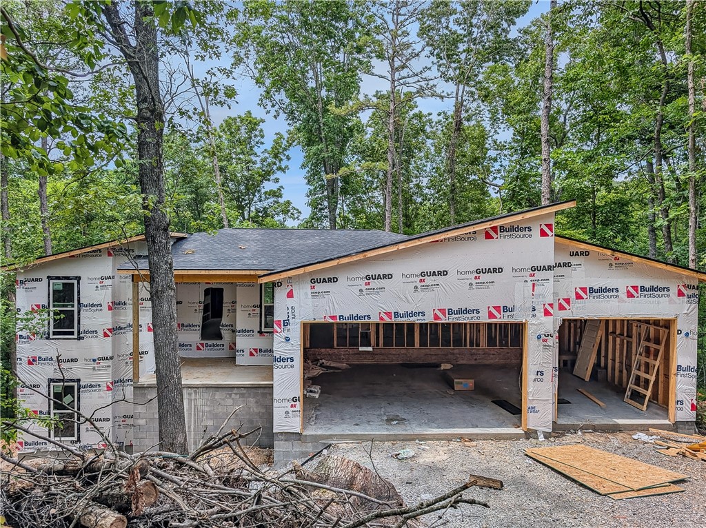 Welcome To Your Next Home! Clean Lines Meet Wooded Vibes - Tucked Into The Trees Of Bella Vista On A Huge 0.75 Acre Lot, This Bold New Build At 15 Patterdale Lane Brings The Vibes In All The Right Waysā5 Bedrooms, 3 Bathrooms, 2 Living Areas, 2 Laundry Rooms, And A 3-Car Garage To Top It Off. The Main Level Serves Up The Primary Suite, 2 Additional Bedrooms, A Full Hall Bath, Gorgeous Kitchen, Dining, And A Wide Open Living Area. Head Downstairs For The Bonus Living Space, 2 More Bedrooms, Guest Bath, And Second LaundryāPerfect For Guests, Teens, Or Multigenerational Living. Expect All The Good Stuff: Custom Cabinets, 3CM Quartz Counters, Wood Plank Flooring, Designer Tile Showers, And Eye-Catching Ceiling Accents. This Oneās Going To Turn Heads. Get In Early And Help Design To Suit Your Style! Donāt Miss It!