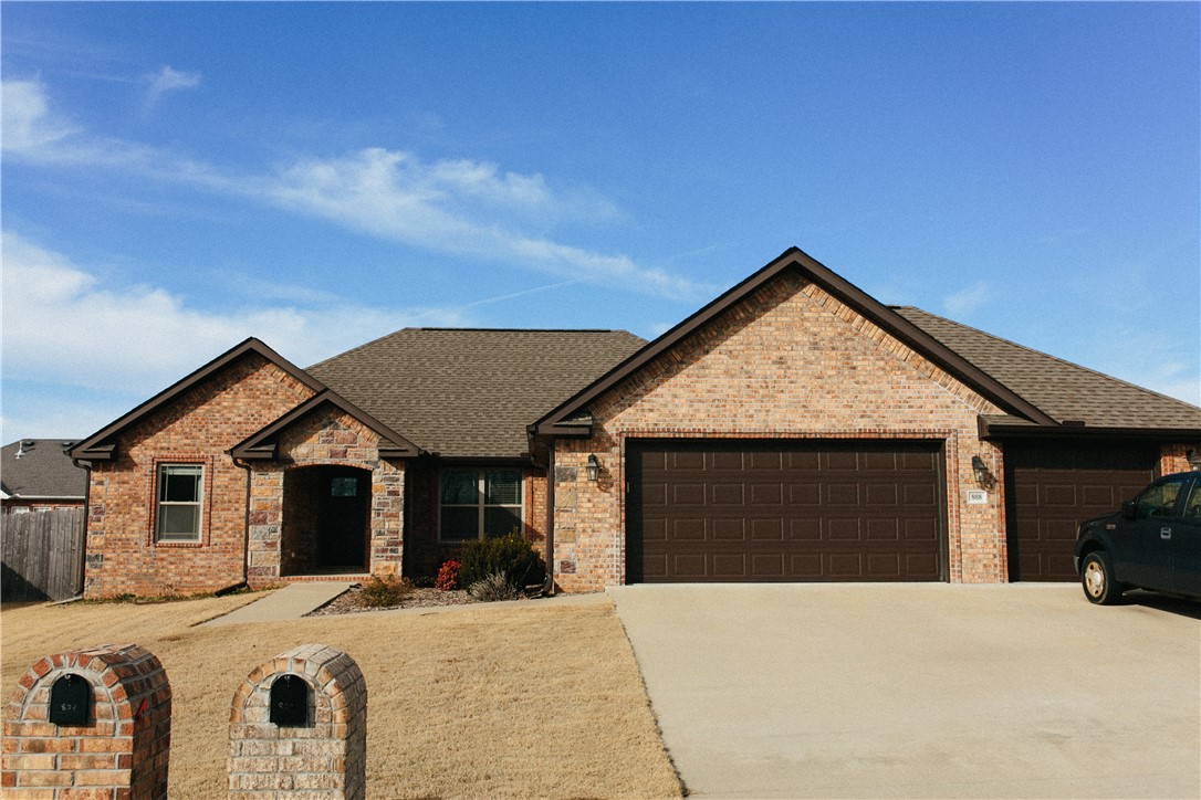 Beautiful, move in ready home in a great neighborhood with an open floor plan kitchen, dining and living room. Under the covered back patio, enjoy evenings next to the outdoor fireplace! Also featured is a two car garage and laundry room. This house is located near Prairie Grove schools, shopping, and the historical Prairie Grove Battlefield State Park. Refrigerator, washer and dryer are negotiable.