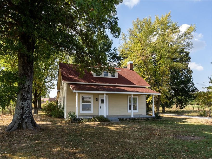 Looking for a true historic farmhouse? This home offers lots of character and charm, plus it is move in ready just waiting for your finishing touches. Beautiful refinished hardwoods, original trim and front door, huge kitchen with endless possibilities for your creative use of the space! Freestanding wood stove, pantry, new central heat and air. Sitting on 1.62 acres with mature trees and old milk barn that could be repurposed. Fenced in back yard is shaded throughout most of the day.