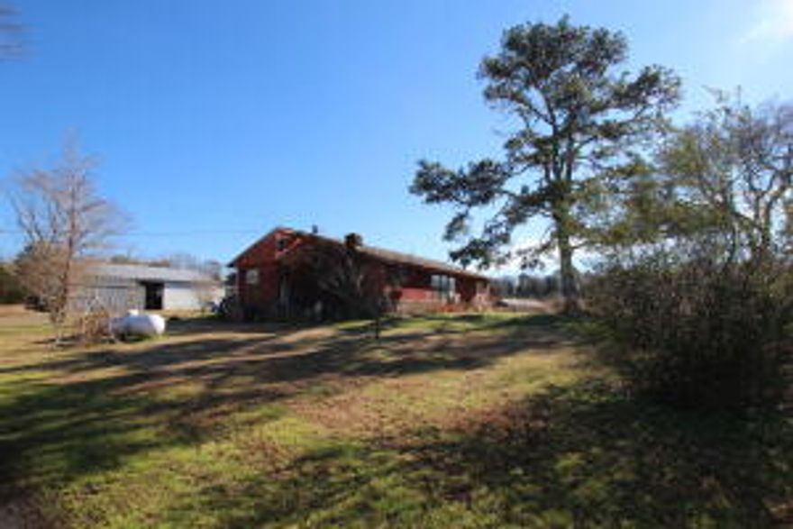 The Ponderosa of Yell county specifically constructed and built with horse barns, cow barns, hay barns, equipment barns, pipe fencing and wire fencing, tremendous amount of pasture grazing already cleared. Plenty of fresh water and ponds on each sectioned off portion for livestock. Connects with Jake creek on one side. Multiple places for building a dream house while you live in the current residence  being renovated currently with 2 or 3 bedrooms could be more, an enormous big room (living) remodeled 2 bathrooms and kitchen with appliances except washer and dryer. Clever central Heat pump, and wood burning outside unit to save money. Arkwest Internet.  A great country home for the owner or the ranch hands.