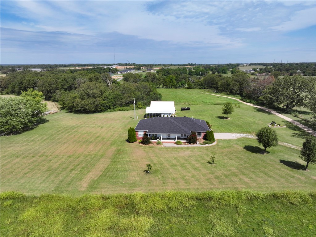 Well maintained immaculate Home, 30 X 40 Shop w/12ā overhang, wood stove in shop, Covered RV carport w/50 amp hook-up, underground storm shelter, all sitting on 10.34 acres in a great location. Hook up for a propane grill, 5 ton A/C unit, whole house 2010 Generac Generator, New Roof 2025, hook-up for a hot tub. Great well but tap has been paid for city water if desired. One owner custom built home in 2003. See full list of amenities attached for more details.