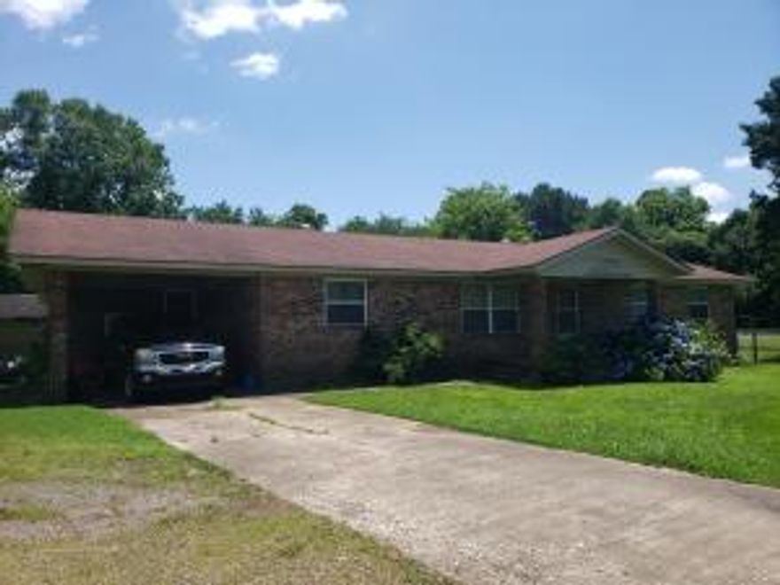 This house will make some family a wonderful home. 3 bedroom, 1.5 bathrooms, 2 living areas, carport and fenced yard. One living area offers a full brick wall fireplace. Property like this is hard to find.