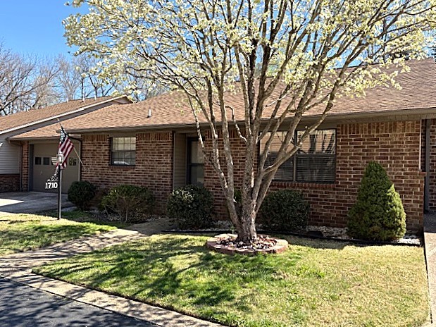 Huge Price Reduction! Now 200,000, plus it has a brand new roof! Pride of ownership is apparent in this immaculate condo! Great location and move in ready, it features 2 bedrooms,2 baths, and spacious rooms. The covered back patio overlooks a very private wooded area, and the backyard is fenced. The 2 car garage is spacious and has a large storage room. Lawn care and swimming pool w/pool house are included in the HOA fee. Great location just 2 miles to downtown.
