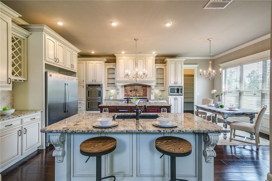 Stunning custom-built home in the gated community of St. Valery Downs!   Premium 1.10 acre lot!   Home boasts a beautiful flowing floor plan with high-end finishes throughout.  Gourmet kitchen with double islands and high end appliances, opening to family room with wooden beams and beautiful built-ins. Features 5 BRS, 5.5Baths, Bonus Room, Media Room, Formal Dining and Office.   Private patio with fireplace and pool-ready backyard! 4 car garage and tons of storage. Amazing place to call home with everything you have been searching for!