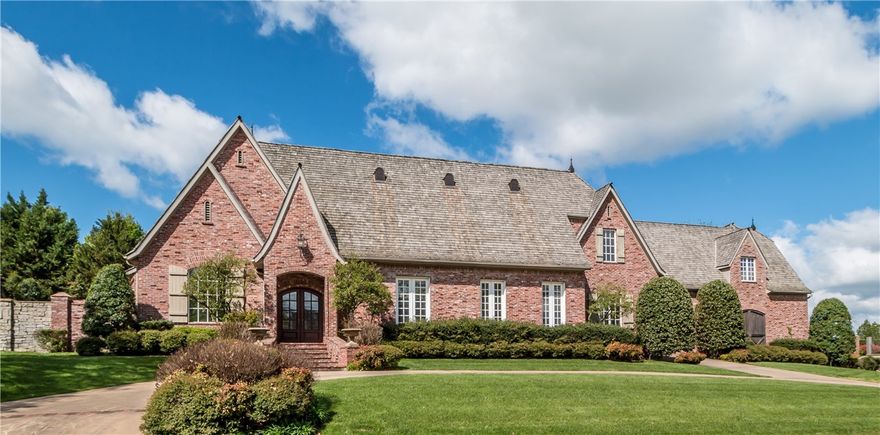 Magnificent home on flat .66 acre lot located on the fairway of hole #10 of Pinnacle Golf Course. Jack Arnold designed home featuring flexible floor-plan. Hand-made Amish beams line the cathedral ceilings, 5 indoor fireplaces, 2 laundry rooms, gourmet kitchen, tornado shelter, hobby room & 4-car garage + golf cart garage. Oversized master closet & spa like master suite with fireplace and outdoor access. Designer finishes throughout. Wood burning fireplace & lush landscaping in English-style courtyard.