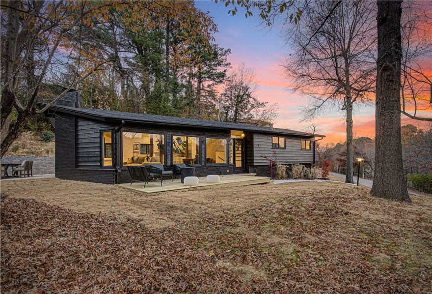 Step into this beautifully remodeled mid-century modern home, spanning 2,444 sqft of thoughtfully designed space. 3 spacious beds & 3 baths featuring Riad Moroccan Tile, each crafted for comfort & style. At the heart of the home, the open-concept kitchen, living, & dining area unfolds as the perfect setting for entertaining & serene everyday living. With scenic views of Lake Lucille & access to fish! This home will be sold furnished with an acceptable offer, allowing you to effortlessly step into a living space already curated with style & comfort in mind. Breathtaking views of Lake Lucille serve as a serene backdrop, elevating the tranquility of your surroundings. With every detail carefully considered, from contemporary updates to classic design elements, this home isn't just a residence—it's a lifestyle for those who seek a perfect blend of modernity & timeless charm. Comes w/brand-new upgrades. New roof, new plumbing & electrical systems, &  HVAC. Realtor Open Fri 17th, 11-1 Public Open Sat 11-1