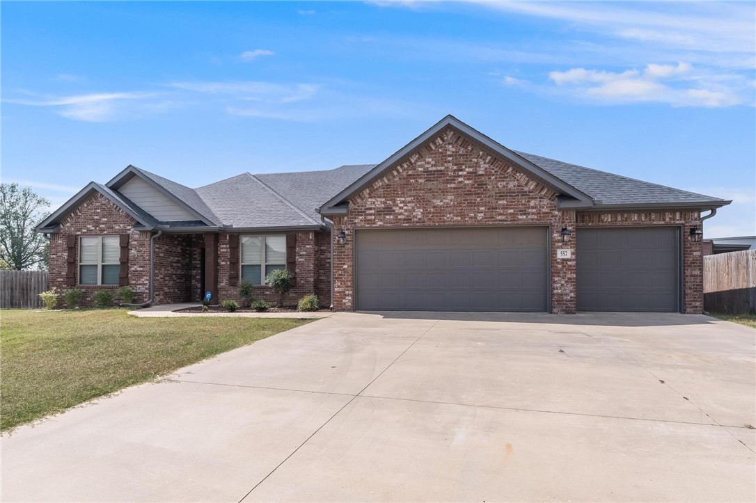 The best house in the best location! This split floor plan is move-in ready with new paint, new roof and gutters - new garage doors are waiting to be installed. You'll find an open floor plan with soaring cathedral ceiling with beam, kitchen with gas range and a walk-in pantry. The laundry room is conveniently connected to the primary bedroom closet. The refrigerator and washer/dryer convey with the house. Subdivision has a community pool for those hot summer days!