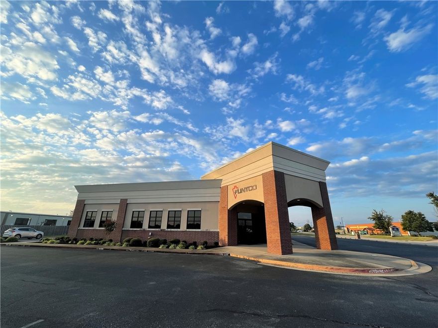 SOLD BEFORE PRINT. Well maintained commercial building for sale, centrally located just off the intersection of Hwy 412 and Hwy 112. 6,447 square feet of professionally built office space. Building sits on a 1.15 acre corner lot with a quarter acre fenced in drop yard in the back. This stand alone office space offers a reception area, 12 private offices, conference room, training room, ample file space, a breakroom with fridge, and multiple hallway work stations. Ample parking with 45 spaces. Building is tenant occupied. NNN Lease. Call agent for details.