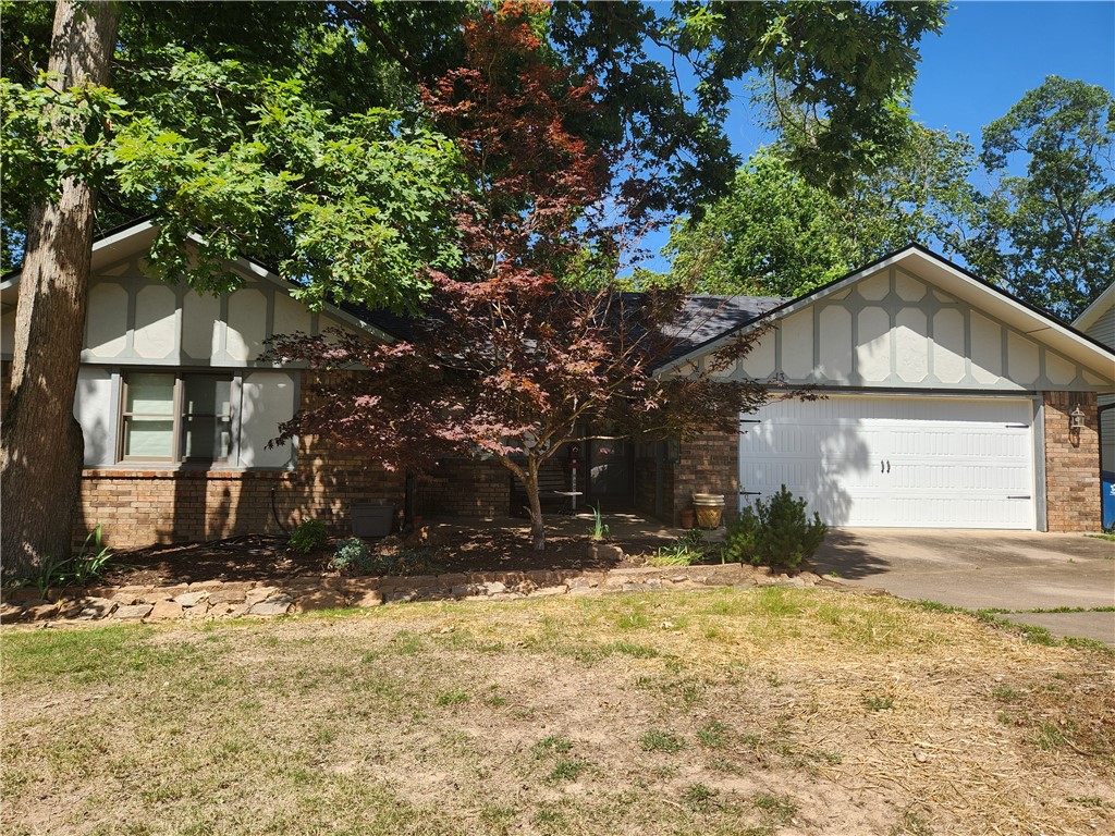 Love mountain biking, golfing, swimming? Less than one mile to the top of the new bike lift, 5 min to Little Sugar trailhead, Landline trail crossing at the top of Kensington,3 minutes to the Bella Vista Rec Center and Kingsdale Golf course, and 3 min to the London Boat Ramp. This 2 bedroom, 2 bath home has a 2 car garage and a second living room. All new hard surface flooring. Walk in the front door and enter into the very spacious living room with gas log fireplace. Hearth is brick from floor to ceiling with wood mantle and is surrounded by large windows. Roomy dining area off the Kitchen. Kitchen has a lot of cabinets, eating bar with updated appliances and lighting. The second living room is an amazing space with cathedral ceilings and floor to ceiling windows which allow for an abundance of natural lighting. Two bedrooms, two baths remodeled with updated lighting,fixtures, etc. Enjoy the screened in porch or the open deck. 224 SF unfinished basement.New roof/gutters/ventilation 2025. SOLD AS IS!! NO FHA,RD,VA