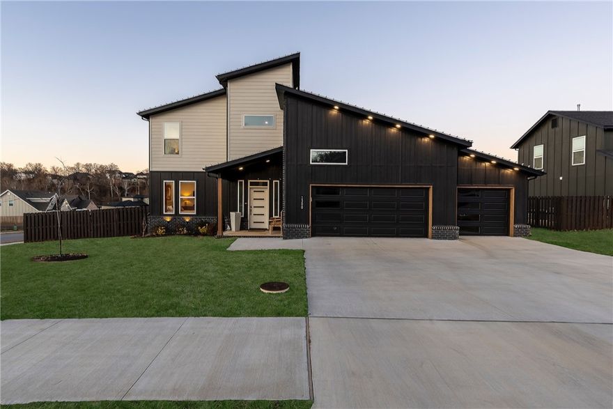 Modern design meets luxury living in this impressive 4-bedroom, 3–full-bath home featuring an open floor plan and a versatile bonus/flex area that adds valuable extra living space. Tall ceilings and clean architectural lines create a bright, spacious atmosphere ideal for everyday living and entertaining.
The kitchen is a standout with beautiful, leathered granite countertops, a convenient pot filler, and a huge pantry offering exceptional storage. Upscale finishes and thoughtful details are found throughout.
Located on a prime corner lot, the outdoor space is designed to impress with custom hardscaping, a built-in firepit, hot tub area, and a covered back deck perfect for year-round enjoyment. A 3-car garage provides ample parking and storage.
Just steps from Big Sugar Golf Course, this modern home offers luxury touches, functional design, and an unbeatable location. Schedule your private showing today or stop by the Open House Sunday 2-4.