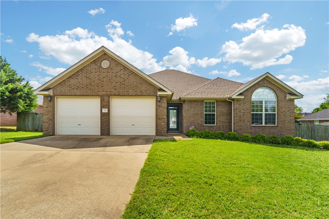 Welcome to your new home in the highly sought after Stonebridge Meadow Subdivision in Fayetteville! This stunning 3 bdm, 2 bath residence offers the perfect blend of comfort & style. An open-concept living area that flows seamlessly into the kitchen and dining space perfect for entertaining or relaxing with family. The split floor plan ensures privacy, placing the primary suite away from the other bdms. The kitchen is a chef's delight featuring black countertops, stainless appliances, double sink, eating bar island and beautiful cabinets. Unwind in the large tranquil primary bedroom with tray ceiling, spa like ensuite. Dual sink in vanity, large separate shower, jetted tub and 2 walk in closest. Enjoy the beautiful Arkansas weather on your covered patio enjoying your morning coffee. Stonebridge Meadow is a premier Fayetteville community known for its amenities like the 18-hole golf course or fishing on the White River. This move in ready home is an exceptional opportunity to experience the best of Fayetteville
