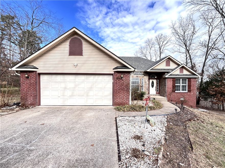 Welcome home to this well-maintained 3-bedroom, 2-bath property located in the desirable Bella Vista community. This inviting home features a privacy-fenced yard and a spacious deck, perfect for relaxing or entertaining. Inside, you’ll find a functional layout , a sunroom filled with natural light, and a modern kitchen equipped with a refrigerator, dishwasher, microwave, garbage disposal, and range/oven, and the attached two-car garage provides ample storage and convenience.