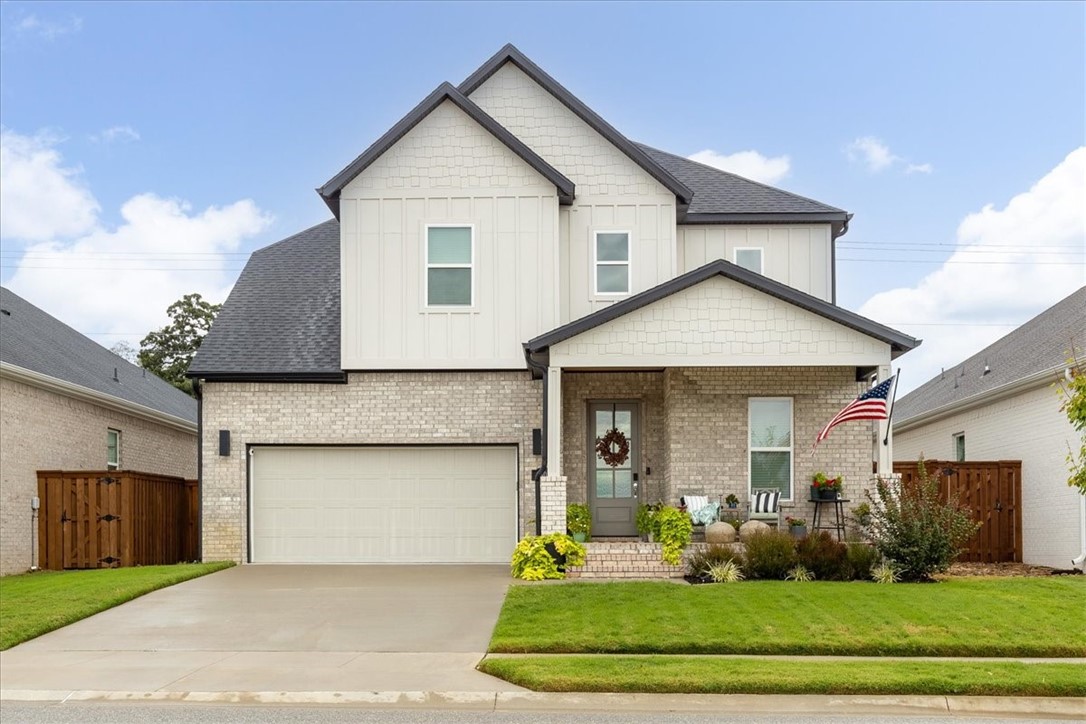 From the beautiful covered front porch to the large, covered patio in the back, this home is meant to be enjoyed inside and out! Like new with designer finishes throughout. Open floor plan with vaulted ceilings and custom beams on the ceiling. Chefs’ kitchen with gas cooktop, quartz counters, Frigidaire pro series appliances, and walk in pantry. French doors to the study on the main level. Primary suite on main level with beautiful primary bath that includes walk-in-closet connected to laundry. 3 additional bedrooms upstairs where you will find 9-foot ceilings and walk in closets. See auroranwa.com for community amenities.