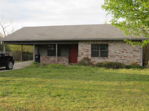 Brick beauty has a great floor plan and QUALITY WORKMANSHIP! Spacious family room, cute kitchen, generously sized bedrooms with lots of closets. Wonderful backyard has a deck and stone patio! Fenced area is great for pets. Walking distance to the university!