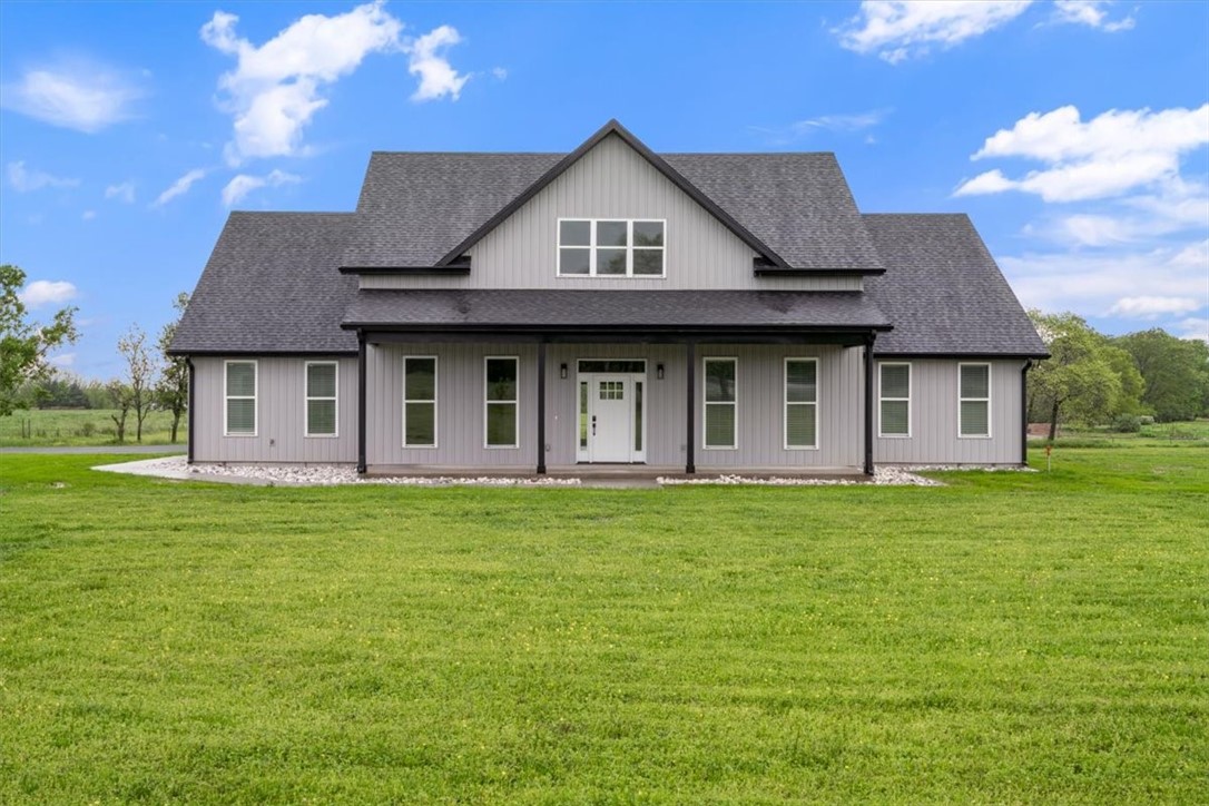 Back on the market at no fault of the sellers! Imagine living on an acreage and not having to drive on gravel, this is it! Off paved road to an asphalted drive, you will find this beautiful new build on a manageable acreage. This home boasts 4 bedrooms and 3 baths with upstairs bonus room and media room. Beautiful views from large windows throughout the house. City water and Pea Ridge schools with bus service. Just minutes to the lake, 36 minutes to Walmart Home Office, 25 minutes to downtown Rogers, 30 minute drive to Eureka Springs. This has a Garfield address but is in the city limits of Gateway. Taxes were calculated on undeveloped land