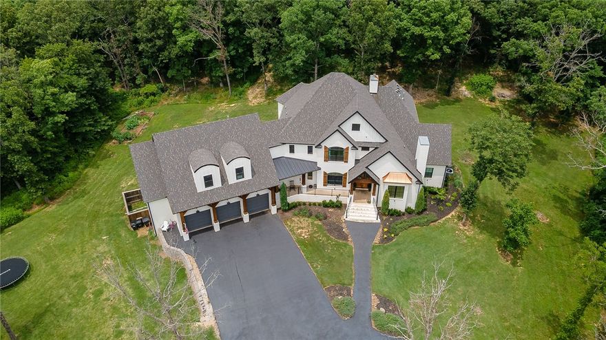 Welcome to 12620 Gailey Hollow we are thankful you have taken your time to look at our listing. This is a 4894 sqft well loved home built in 2018. 6 beds, 4.5 baths.With 2 beds, the primary and guest downstairs, primary has a door that goes to the 8'4x24' screened back porch that transitions to the back door by kitchen area. Has a spacious living room and kitchen area as well as a mud room off garage with 2 washers and 2 dryers that convey. Elegant kitchen with all the features you desire as well as a dining room that is off the kitchen/living area. There is a den/study area as well on the lower level. Upper level has 4 beds and 2 baths as well as additional living room or den area. Upper floor is Vinyl plank flooring and the lower level is polished concrete. The oversized garage is 23' deep x 34'4" wide and holds 3 cars. Inground 1000 gallon propane tank conveys. 30'x39' Basketball court. Inground vinyl lined pool. Yard is landscaped and home is ready for new owners. Back on the market at no fault of the sellers.