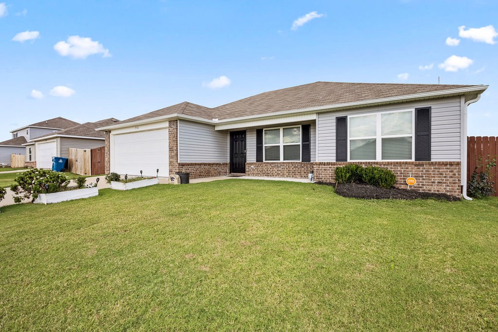Fabulous home in the Silver Meadows Subdivision! Beautifully maintained featuring open living space and eat-in kitchen with pantry, stainless steel appliances and wrap around counter giving splendid practicality. Separate laundry room gives dedicated space to keep things tidy. Spacious bedrooms with split bedroom floorplan providing functionality for everyone. Wonderful backyard that is fully fenced providing the perfect place for private relaxation. Washer, dryer, refrigerator and Vivant security system conveys to buyer adding both security and ease to your daily routine! Conveniently located less than 10 minutes away from XNA Airport and Benton County Fairgrounds with Walmart distribution centers close by. This is the one you have been looking for!