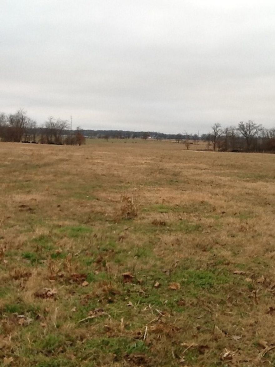 Great development property, close to XNA,Public water at street, over a thousand feet of road frontage.