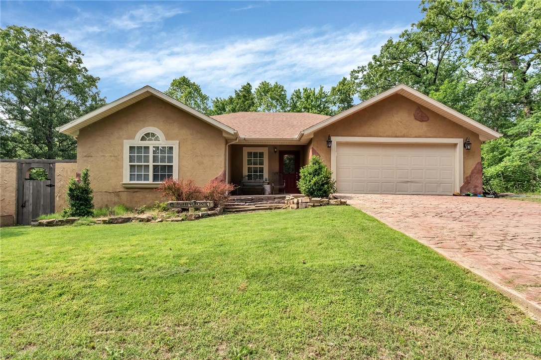 Charming 3-bedroom, 2-bath home on a quiet corner lot in a peaceful neighborhood. This well-maintained property features a split floor plan with vaulted and recessed ceilings, ceiling fans, blinds, a cozy gas fireplace, and an eat-in kitchen. The level lot offers space and comfort, perfect for relaxing and spotting local deer. Includes a 2-car garage and is priced to sell. Available for showings starting 5/27/25!