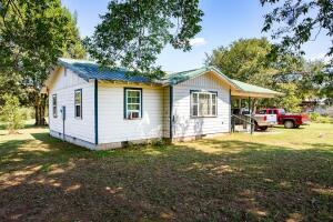 Two bed and two bath home setting on 15 acres with public water, but also has two wells on property. The property also has a work shop that is approx. 18 ft, by 40 ft and a small chicken house with pen.